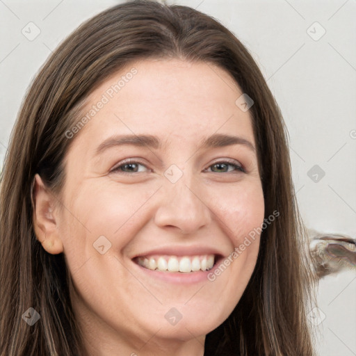 Joyful white young-adult female with long  brown hair and grey eyes