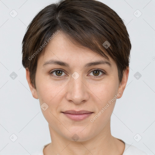 Joyful white young-adult female with short  brown hair and brown eyes