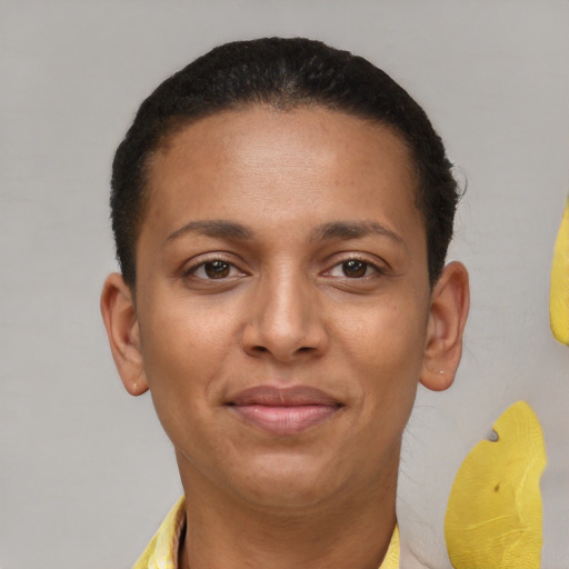 Joyful latino young-adult female with short  brown hair and brown eyes