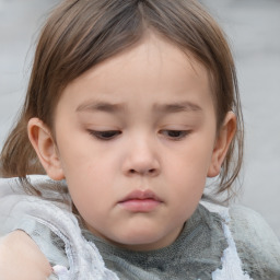 Neutral white child female with medium  brown hair and brown eyes