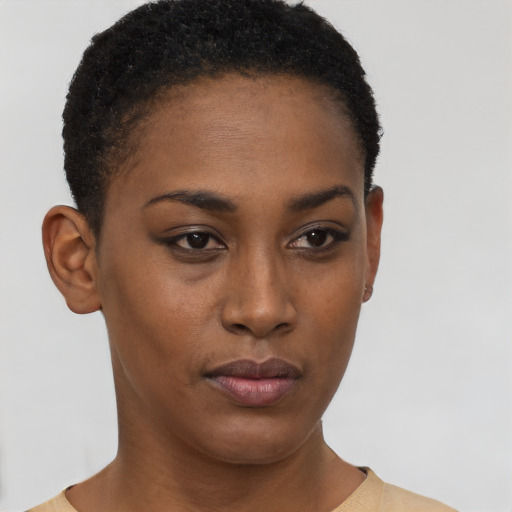 Neutral black young-adult female with short  brown hair and brown eyes