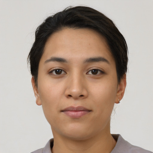 Neutral latino young-adult female with short  brown hair and brown eyes