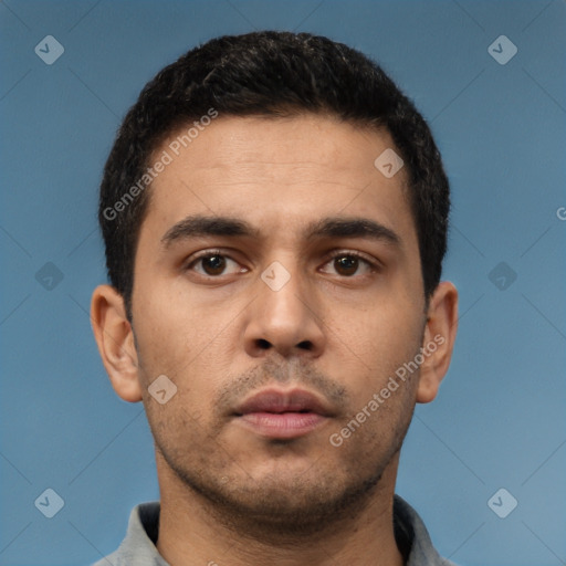 Neutral latino young-adult male with short  black hair and brown eyes