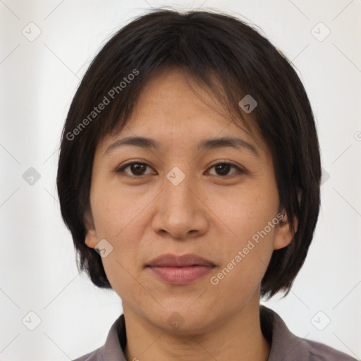 Joyful white adult female with medium  brown hair and brown eyes