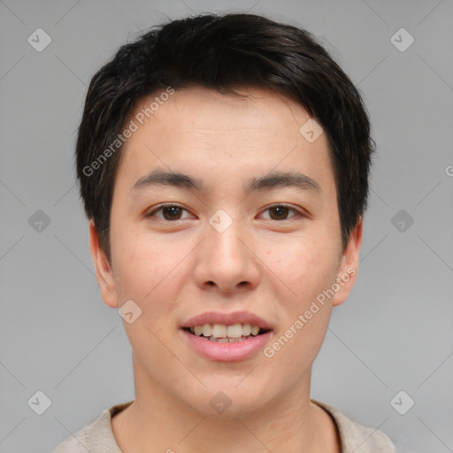 Joyful asian young-adult male with short  brown hair and brown eyes