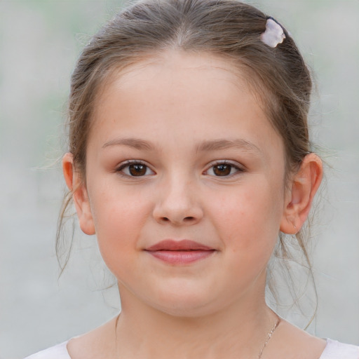 Joyful white child female with medium  brown hair and brown eyes