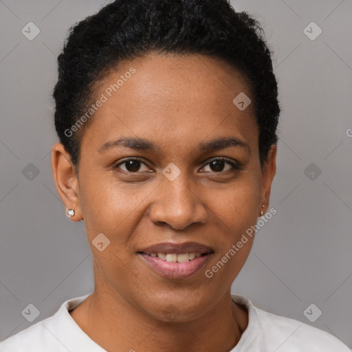 Joyful black young-adult female with short  black hair and brown eyes