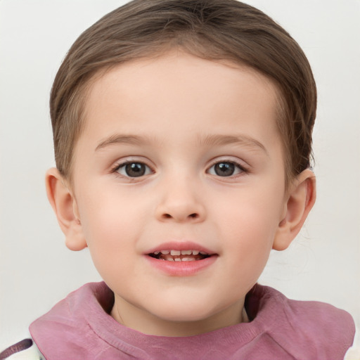 Joyful white child female with short  brown hair and grey eyes