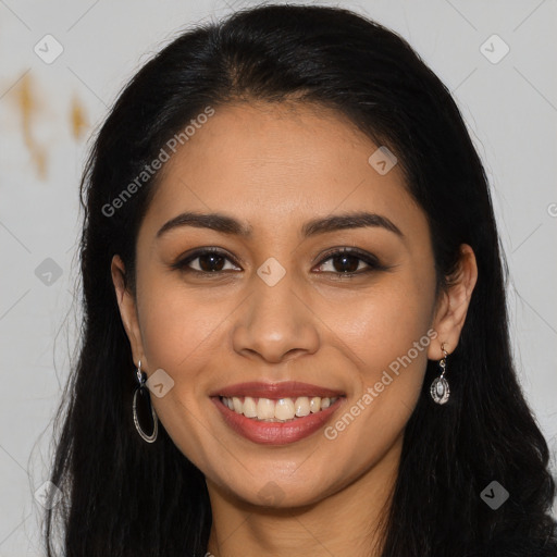 Joyful latino young-adult female with long  brown hair and brown eyes