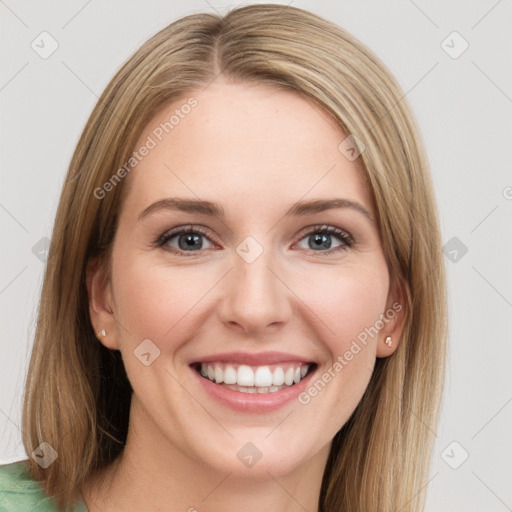 Joyful white young-adult female with long  brown hair and grey eyes