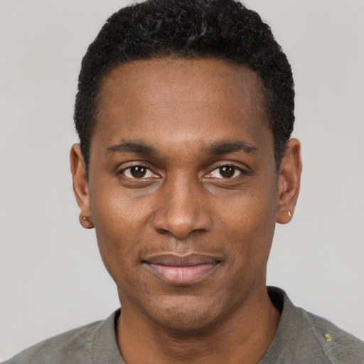 Neutral black young-adult male with short  black hair and brown eyes