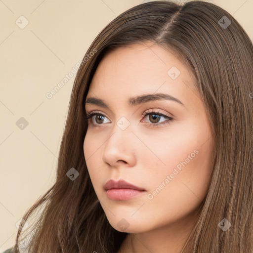 Neutral white young-adult female with long  brown hair and brown eyes