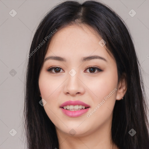 Joyful asian young-adult female with long  black hair and brown eyes