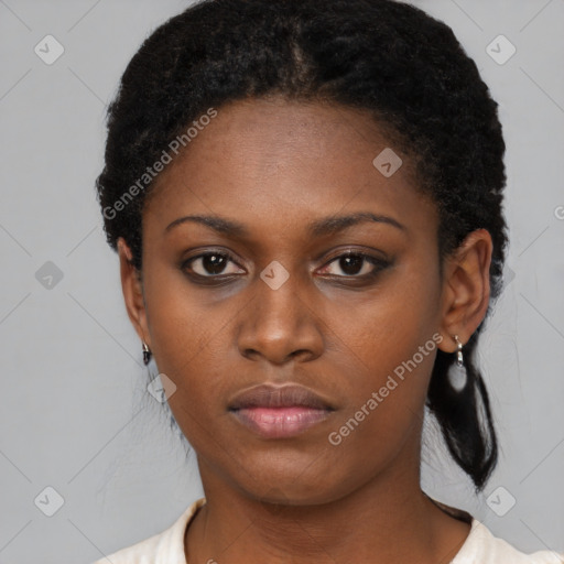 Neutral black young-adult female with short  black hair and brown eyes