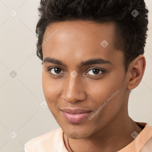 Joyful black young-adult male with short  brown hair and brown eyes