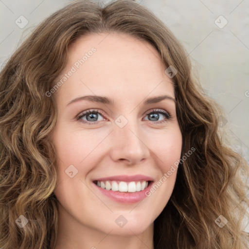 Joyful white young-adult female with long  brown hair and green eyes