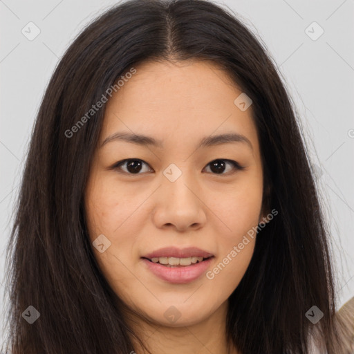 Joyful asian young-adult female with long  brown hair and brown eyes