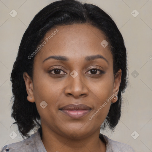 Joyful black young-adult female with medium  black hair and brown eyes