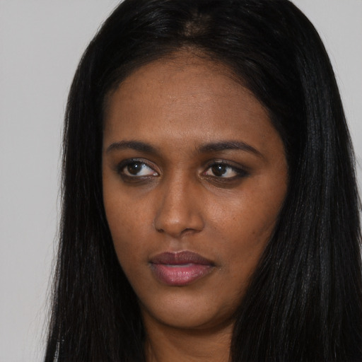 Neutral asian young-adult female with long  brown hair and brown eyes