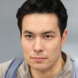 Neutral asian adult male with short  brown hair and brown eyes