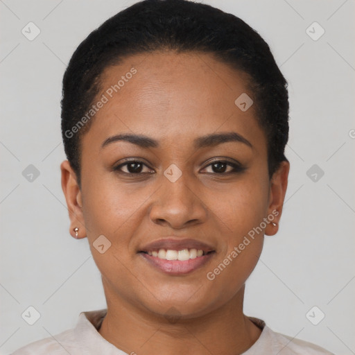 Joyful latino young-adult female with short  black hair and brown eyes