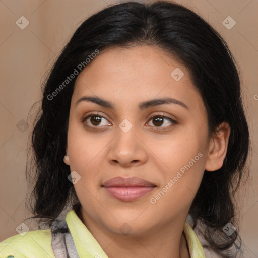 Joyful latino young-adult female with medium  brown hair and brown eyes