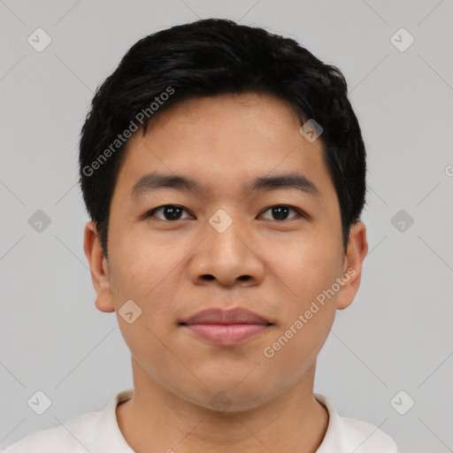 Joyful asian young-adult male with short  black hair and brown eyes