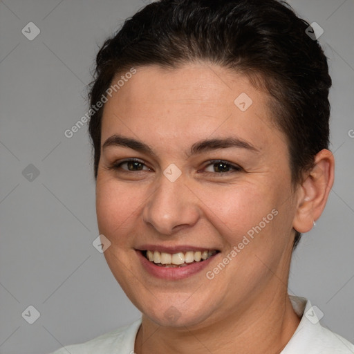 Joyful white young-adult female with short  brown hair and brown eyes