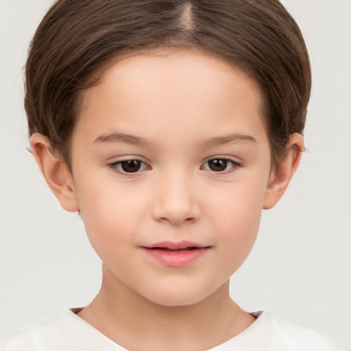 Joyful white child female with short  brown hair and brown eyes