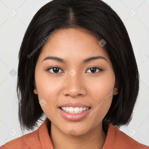 Joyful white young-adult female with long  black hair and brown eyes