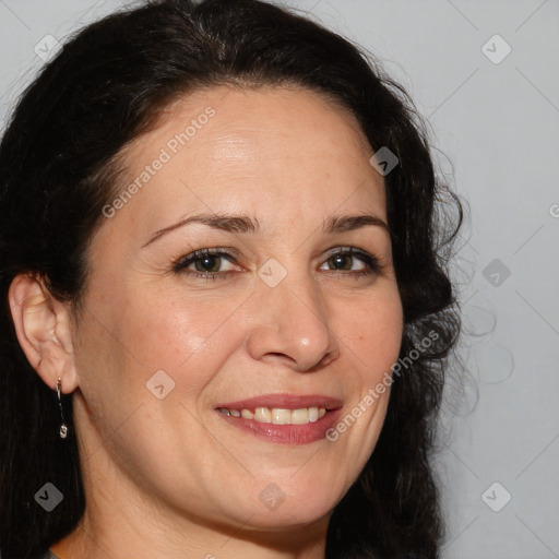 Joyful white adult female with long  brown hair and brown eyes