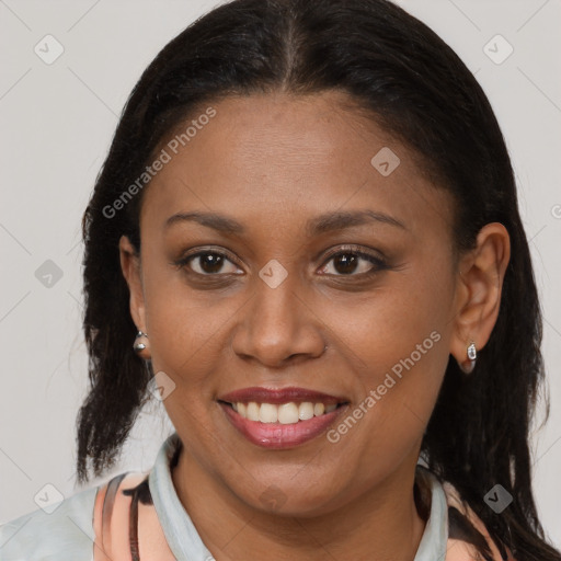 Joyful black young-adult female with medium  brown hair and brown eyes