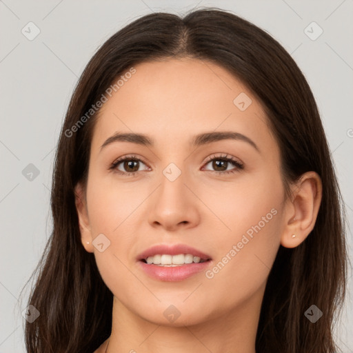 Joyful white young-adult female with long  brown hair and brown eyes