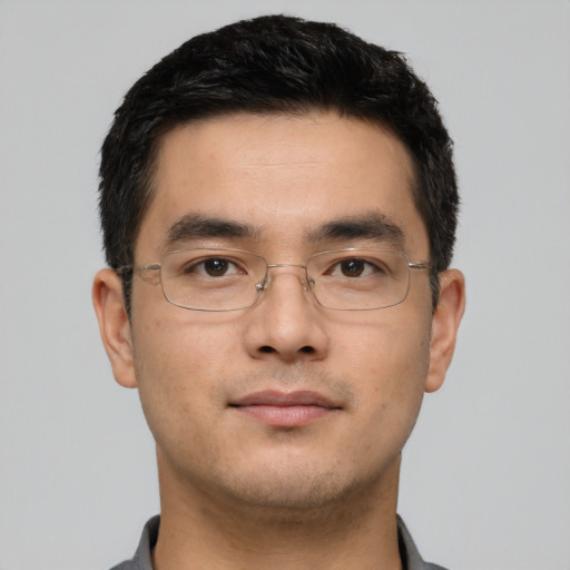 Neutral asian young-adult male with short  black hair and brown eyes