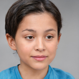 Joyful white child female with short  brown hair and brown eyes