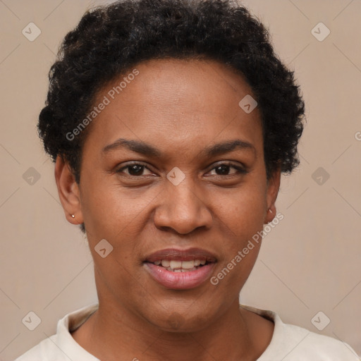 Joyful black adult female with short  brown hair and brown eyes