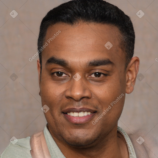 Joyful latino young-adult male with short  black hair and brown eyes