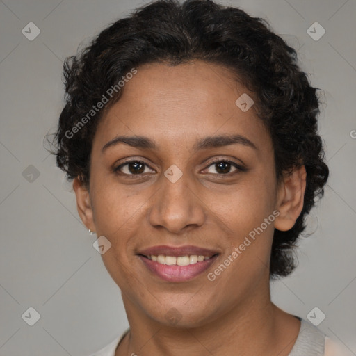 Joyful latino young-adult female with short  brown hair and brown eyes