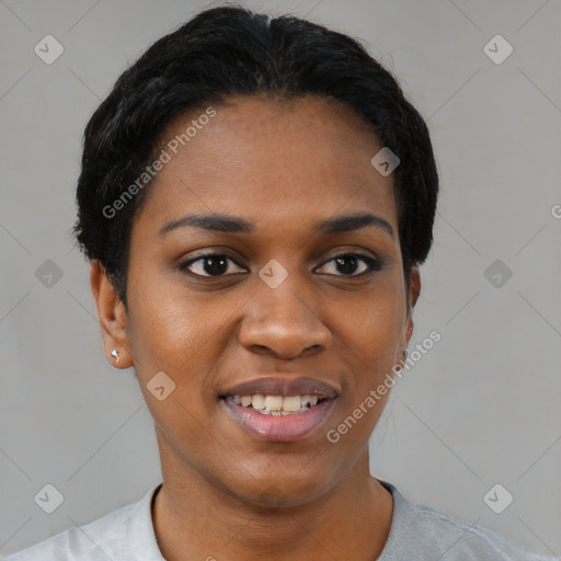 Joyful black young-adult female with short  black hair and brown eyes