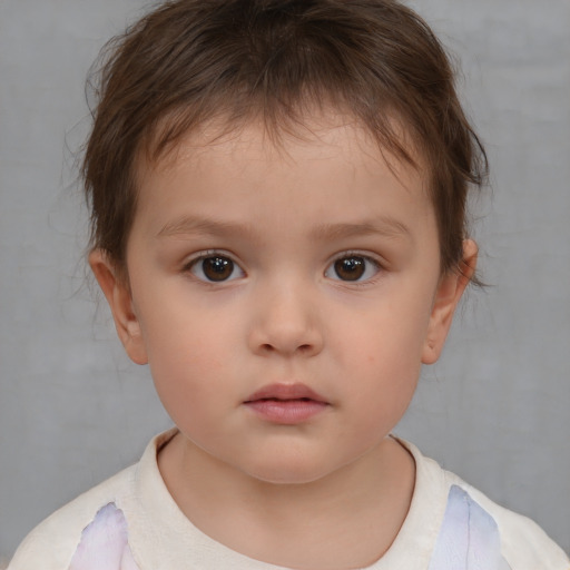 Neutral white child female with medium  brown hair and brown eyes