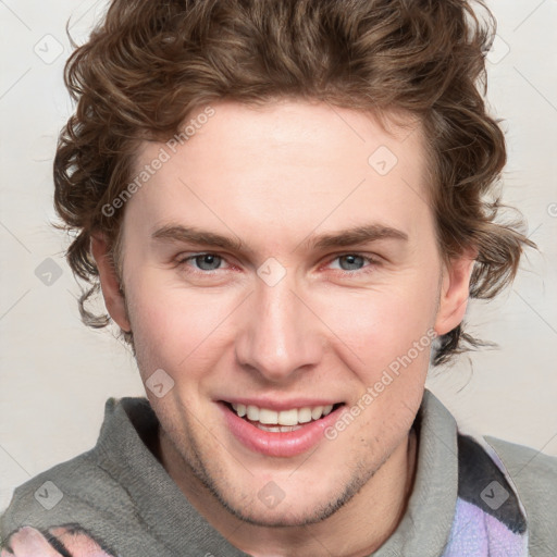 Joyful white young-adult male with medium  brown hair and blue eyes