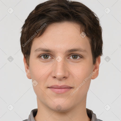 Joyful white young-adult female with short  brown hair and grey eyes