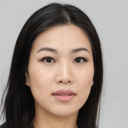 Neutral asian young-adult female with long  black hair and brown eyes