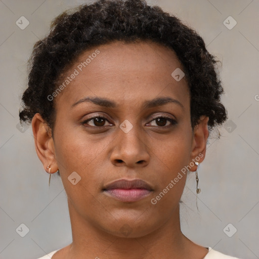 Neutral black young-adult female with short  brown hair and brown eyes