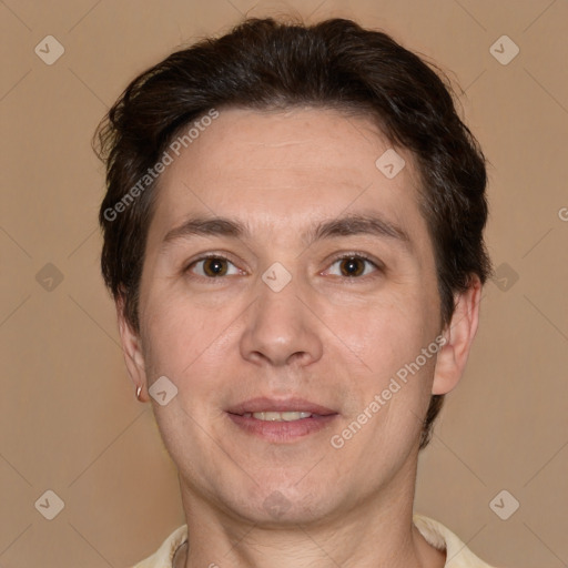 Joyful white adult male with short  brown hair and brown eyes