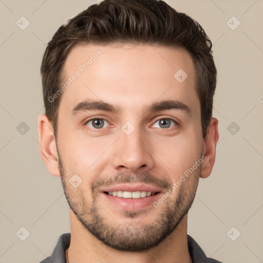 Joyful white young-adult male with short  brown hair and brown eyes