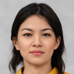 Neutral asian young-adult female with medium  brown hair and brown eyes