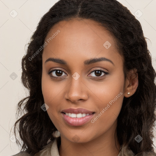 Joyful latino young-adult female with long  brown hair and brown eyes