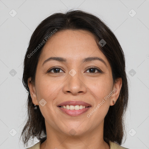 Joyful white adult female with medium  brown hair and brown eyes