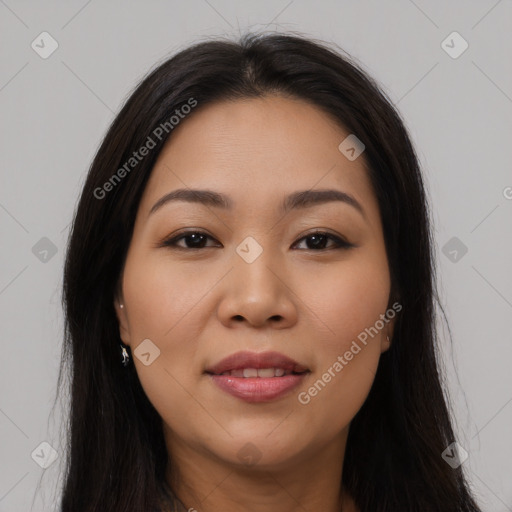 Joyful asian young-adult female with long  brown hair and brown eyes